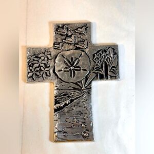 Silver Sand Dollar Cross from Ala Carte - story on back